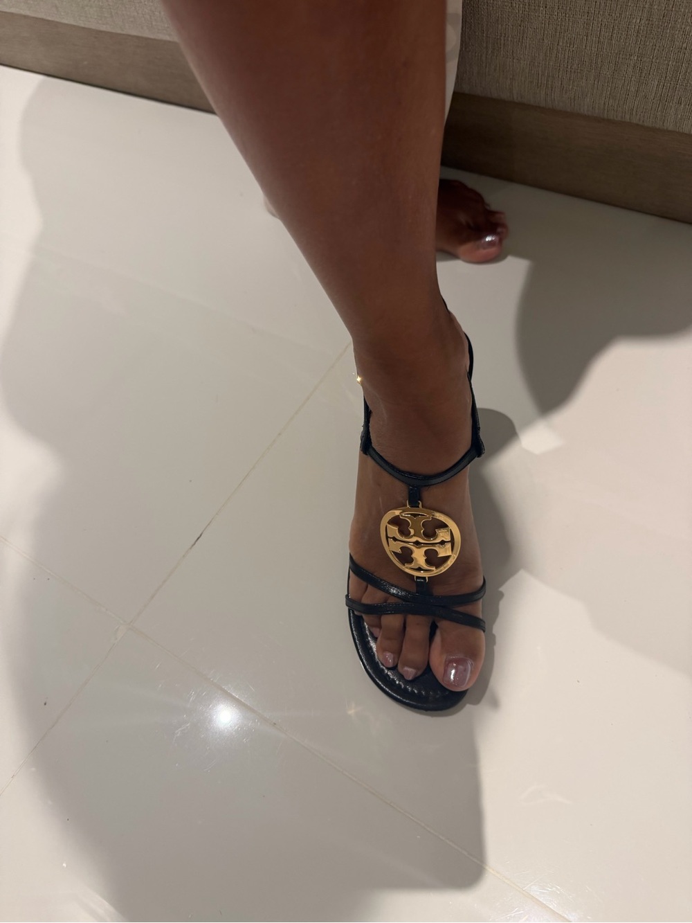 Tory Burch Black Leather T-Strap Sandals with Gold Logo Medallion